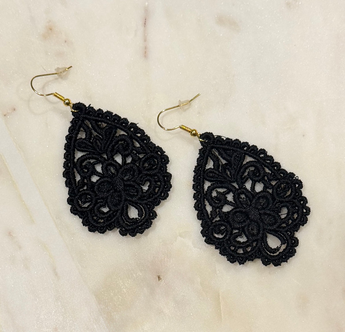 Black and gold teardrop earrings made from embroidery 