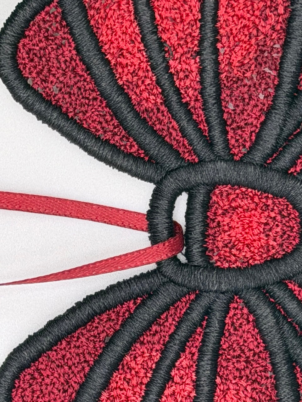 Handmade Embroidered Christmas Bow – Red & Black Ornament
