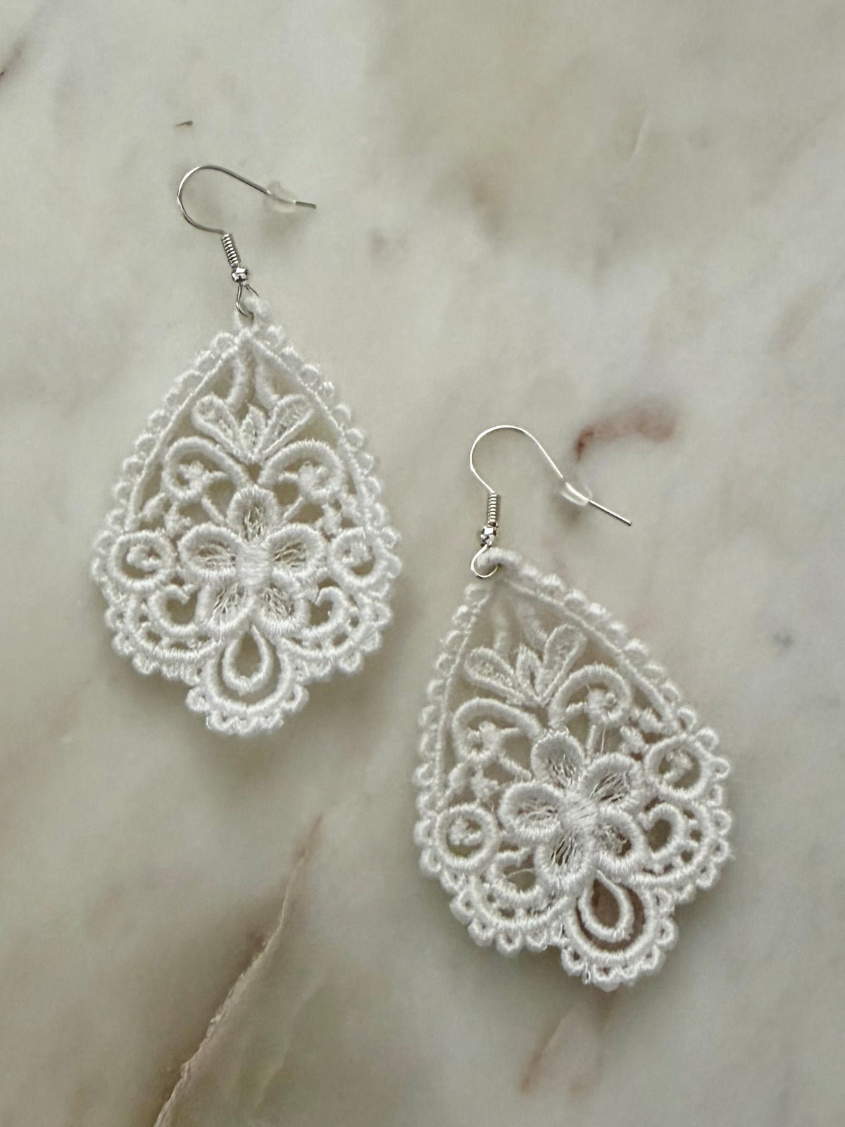 white and sliver tone teardrops